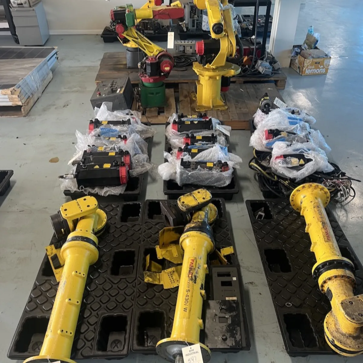 Industrial robot in a fabrication cell documented during an equipment appraisal