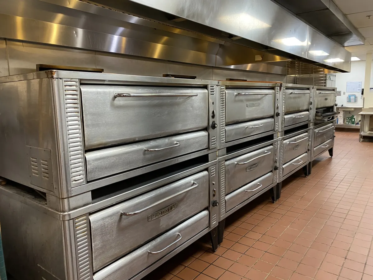 Restaurant cooking line and hood documented during an FF&E appraisal