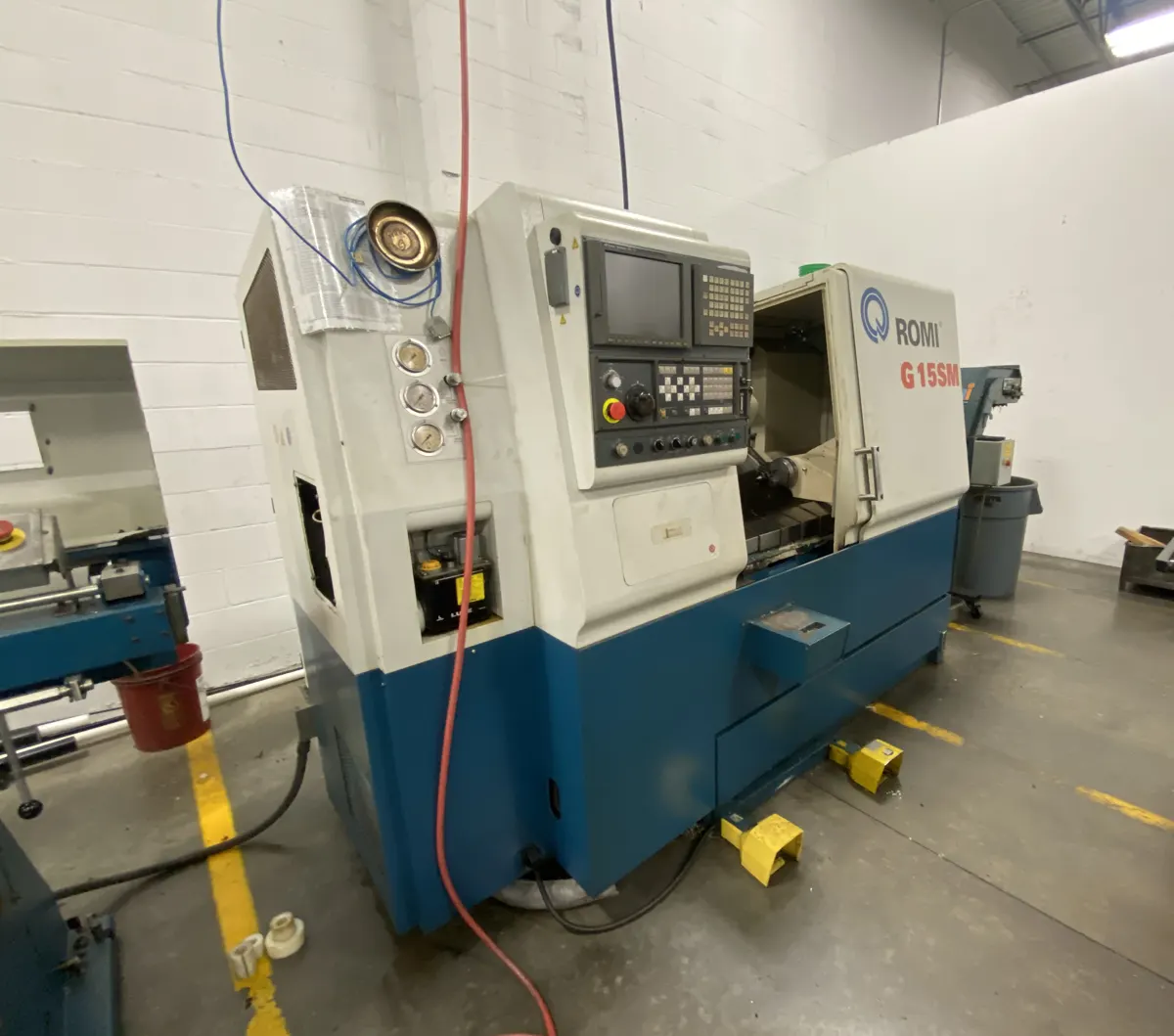 Romi CNC lathe on a shop floor